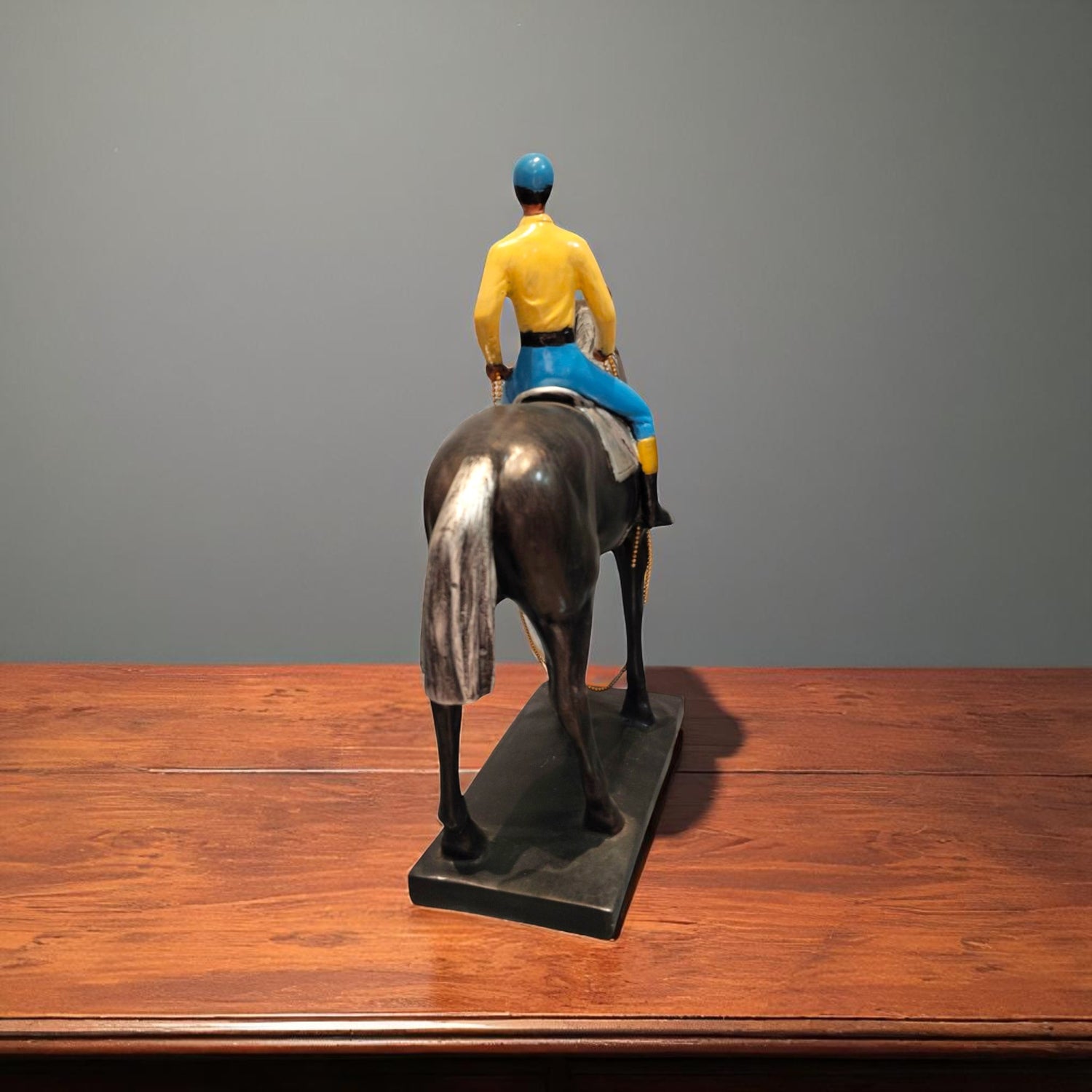 Back view of rider on black horse showpiece decor