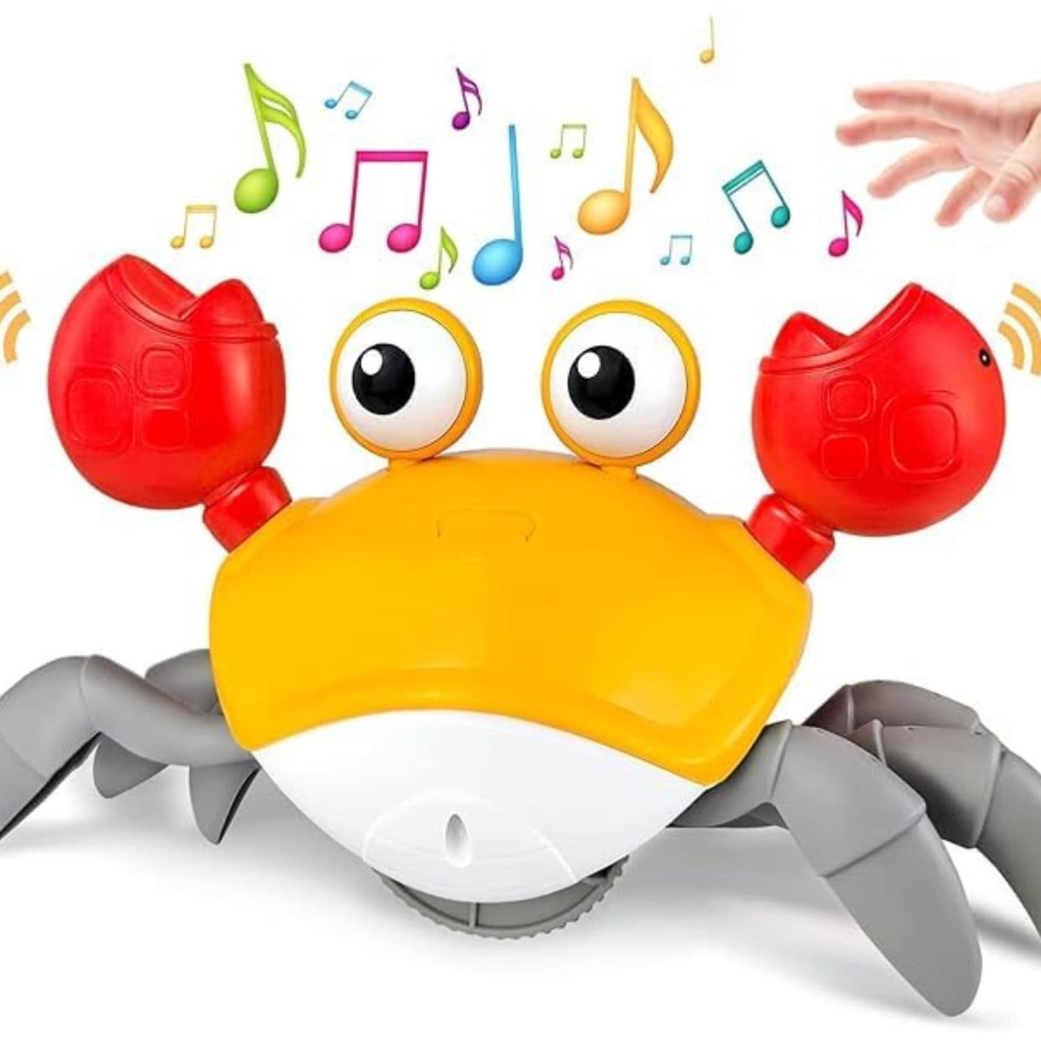 Toy crab with music notes and a hand interacting with it on a white background