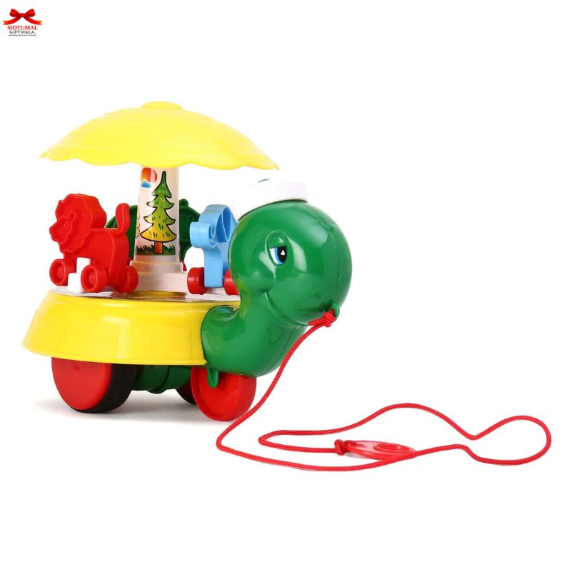 Colorful toy with a green worm-like character and red wheels on a white background