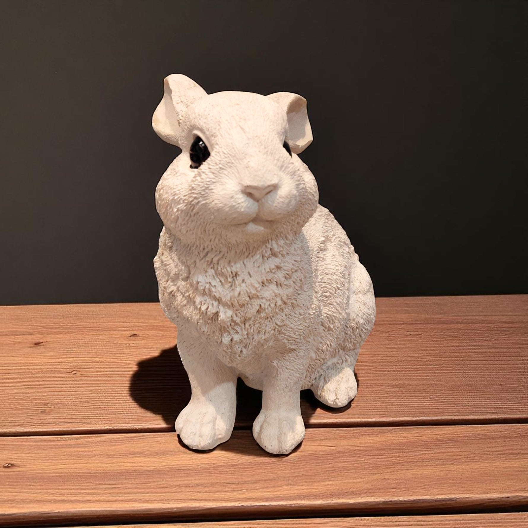 Front view of white rabbit animal showpiece on wooden table – Motumal Giftwala