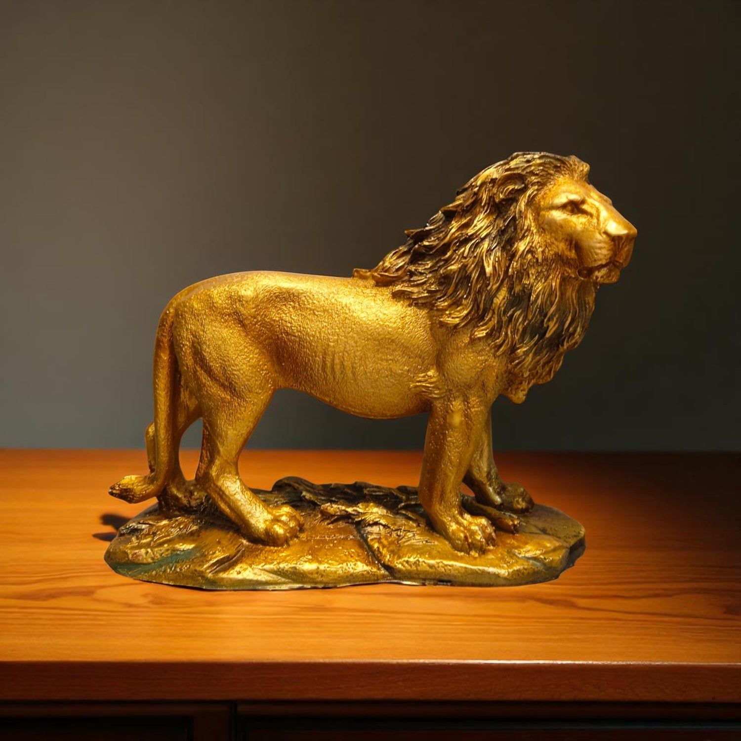 Lion sculpture side pose in golden finish – Ranchi décor gift