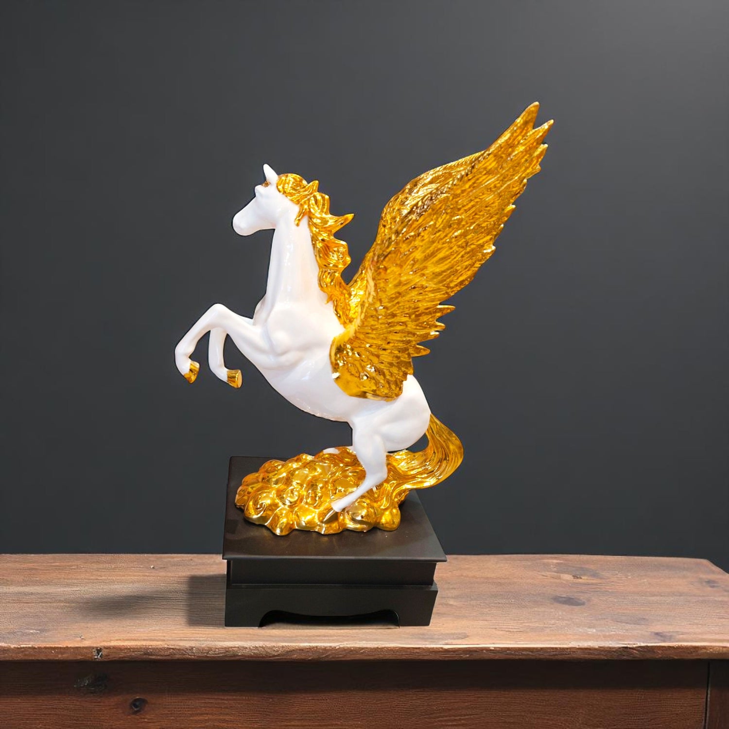 Luxury flying horse showpiece placed on wooden table with spotlight
