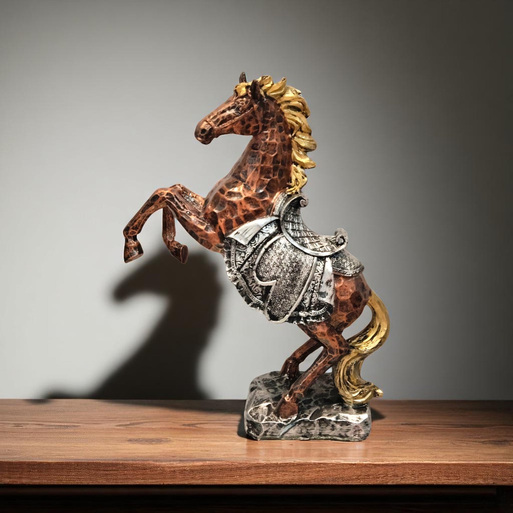 Side view of warrior horse showpiece with silver armor and golden mane