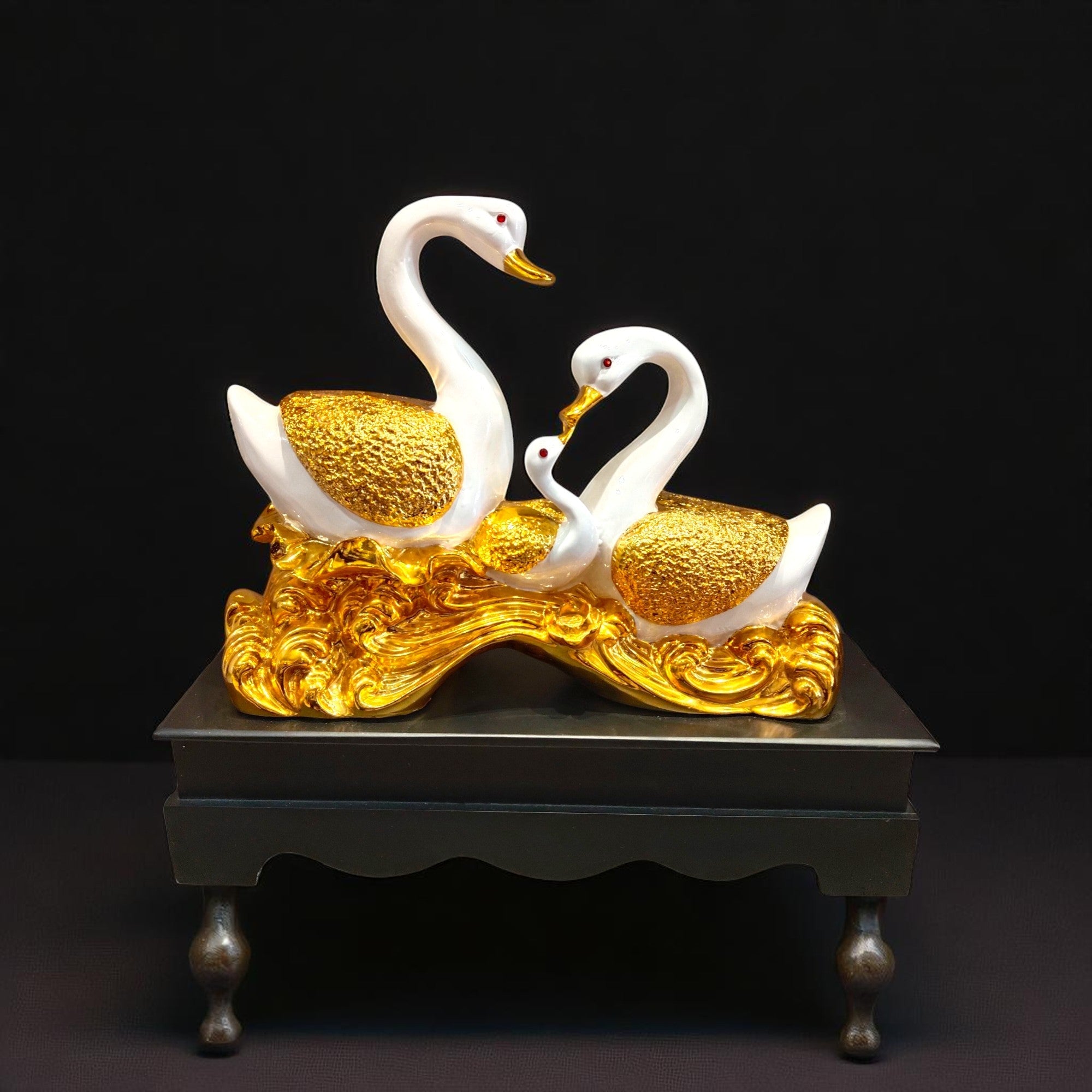 "Golden Swan Family Showpiece with antique gold waves – symbol of love, togetherness and peace, perfect for home decor and anniversary gifting | Motumal Giftwala Ranchi"