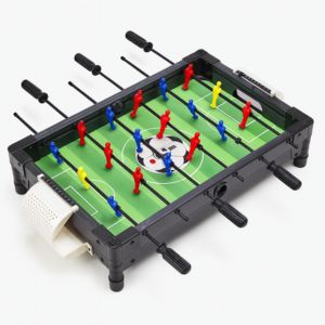 Mini foosball tabletop game with red, blue, and yellow players on green field
