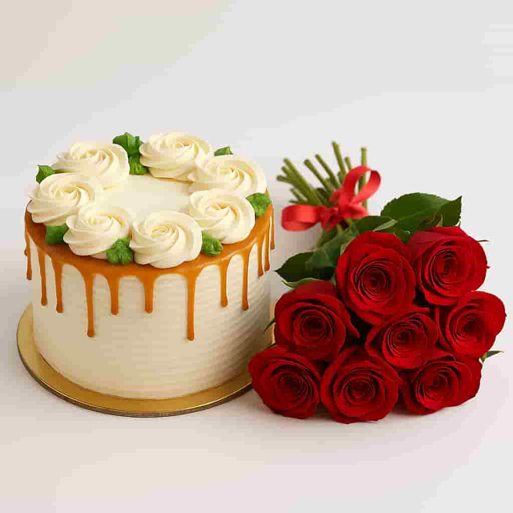 “Motumal Giftwala cake and roses combo — elegant white cream cake with red rose bouquet, perfect for birthdays, anniversaries, and romantic celebrations in Ranchi.”