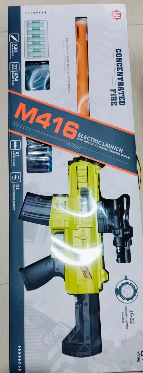 A toy gun packaged in a box, predominantly black and yellow in color, with the model number M416 visible.