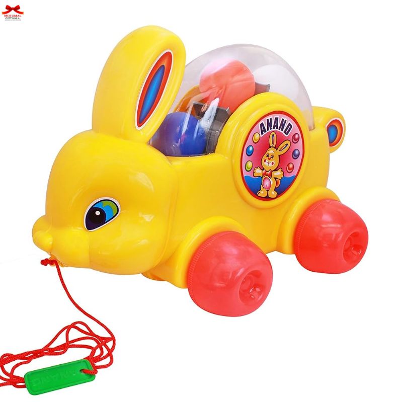 Colorful toy rabbit with a pull string on a white background