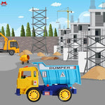 Toy dump truck on a construction site with a crane and building in the background.