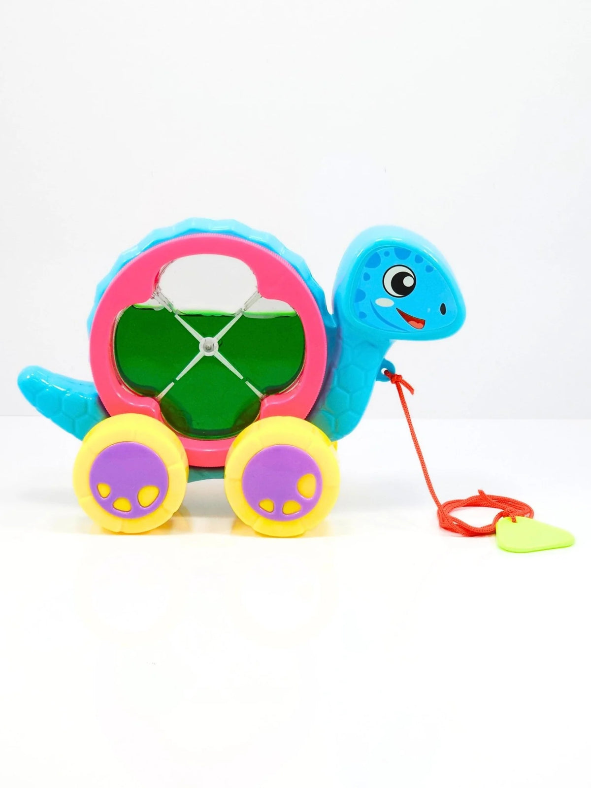 Colorful toy turtle with wheels on a white background