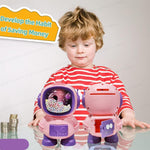 Child with two robot-like piggy banks on a reflective surface, with text about developing saving money habits.