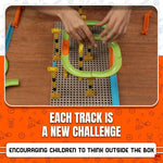 Children's toy track set on a wooden surface with text encouraging creativity.