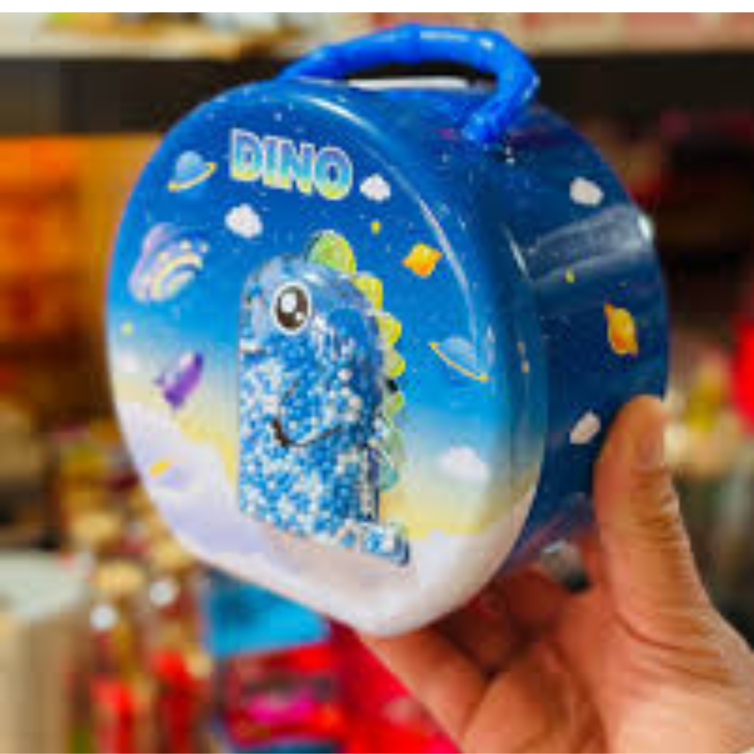 Blue round dinosaur piggy bank with cute cartoon design and handle for kids savings by Motumal Giftwala