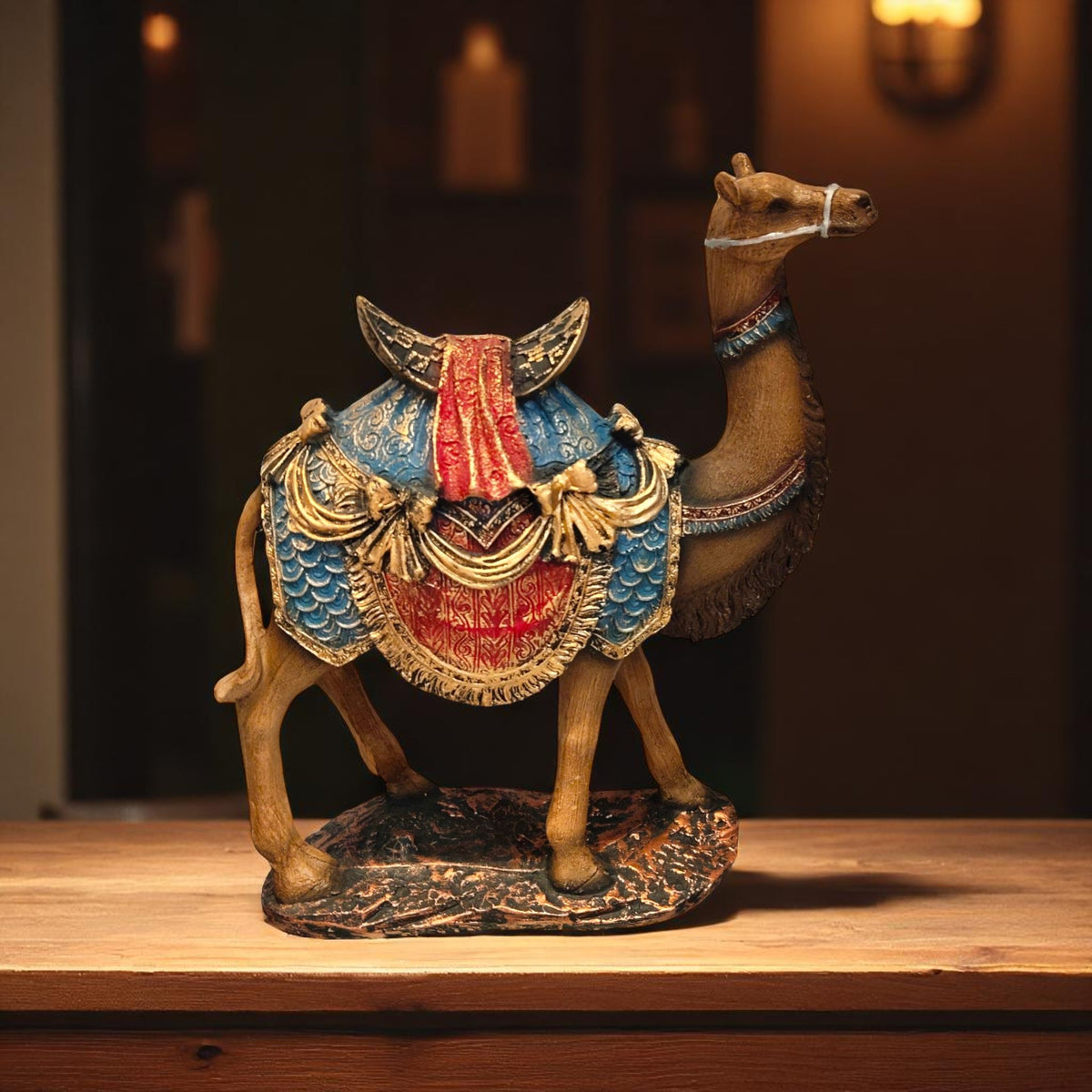 Side profile of Rajasthani camel showpiece with antique blue-red saddle