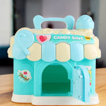  Blue candy shop money bank inserting 100 rupee note into slot