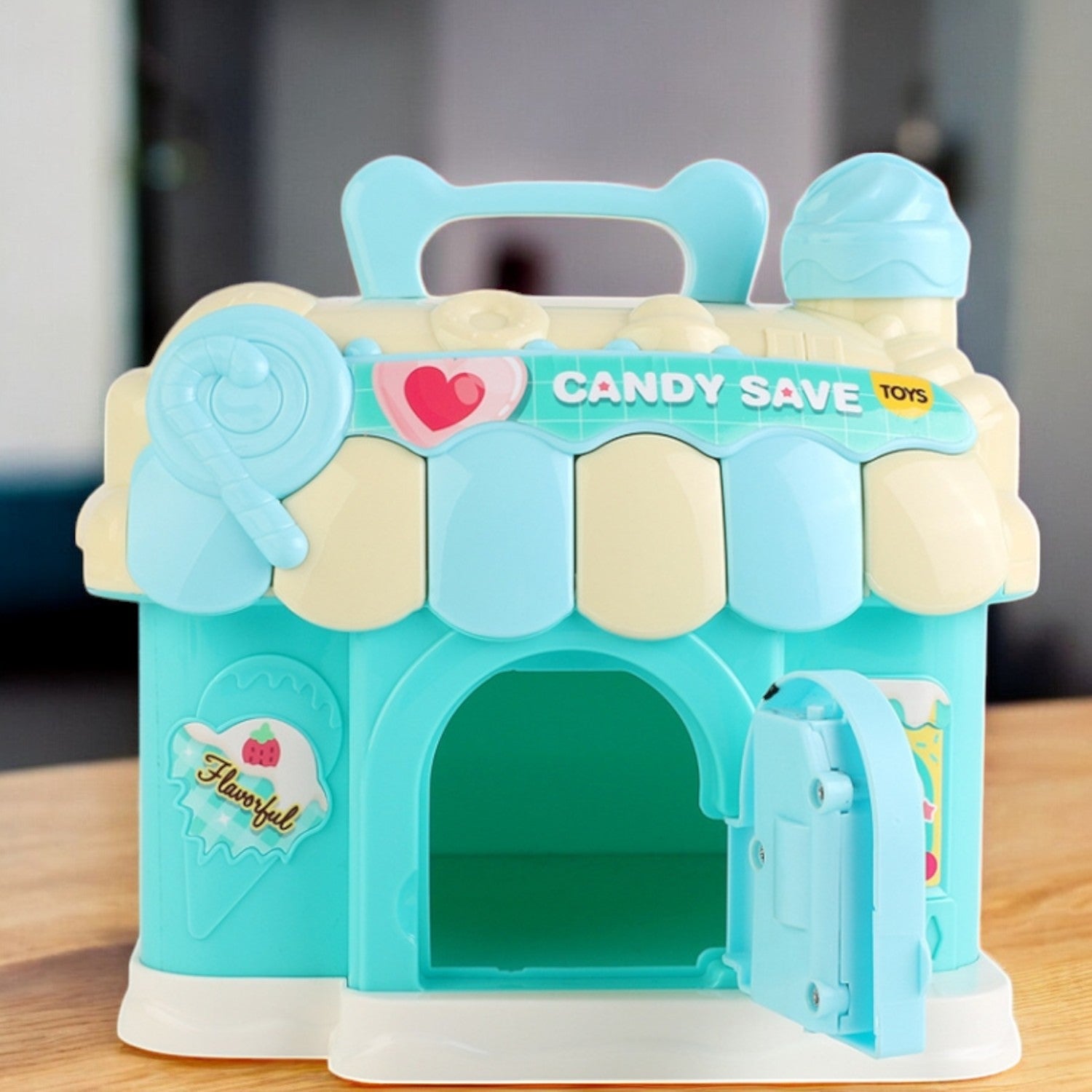  Blue candy shop money bank inserting 100 rupee note into slot