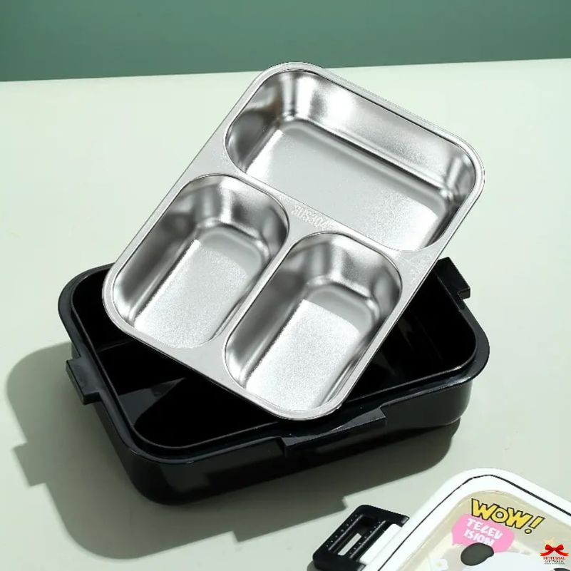 Stainless steel compartmentalized food container with black lid on a light green background