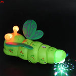 Toy caterpillar with lights and sounds on a dark background