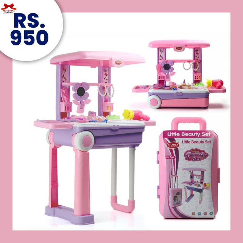 Pink toy beauty set with accessories and packaging on a white background