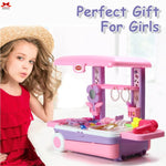 Girl in a red dress with a toy jewelry stand labeled 'Perfect Gift For Girls'.