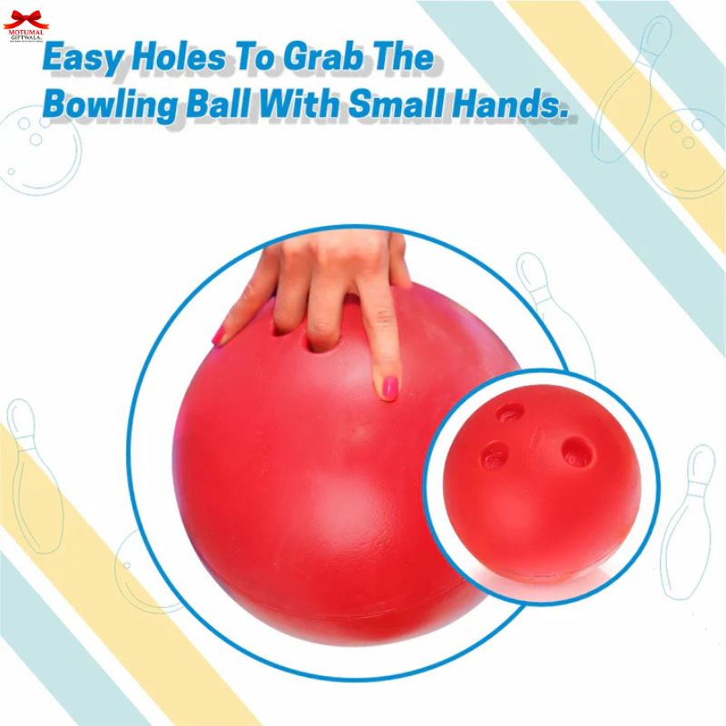 Red bowling ball with holes for small hands, held by a hand.