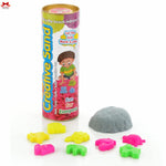 Tube of Creative Sand with colorful sand toys on a white background