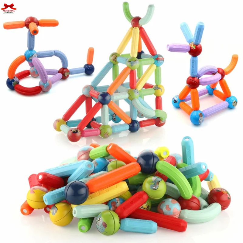 Colorful magnetic building toys on a white background