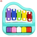 Colorful toy keyboard with xylophone keys on a white background