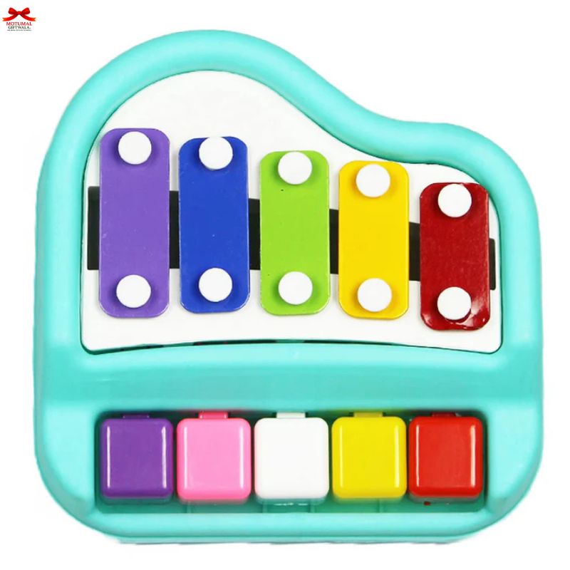 Colorful toy keyboard with xylophone keys on a white background