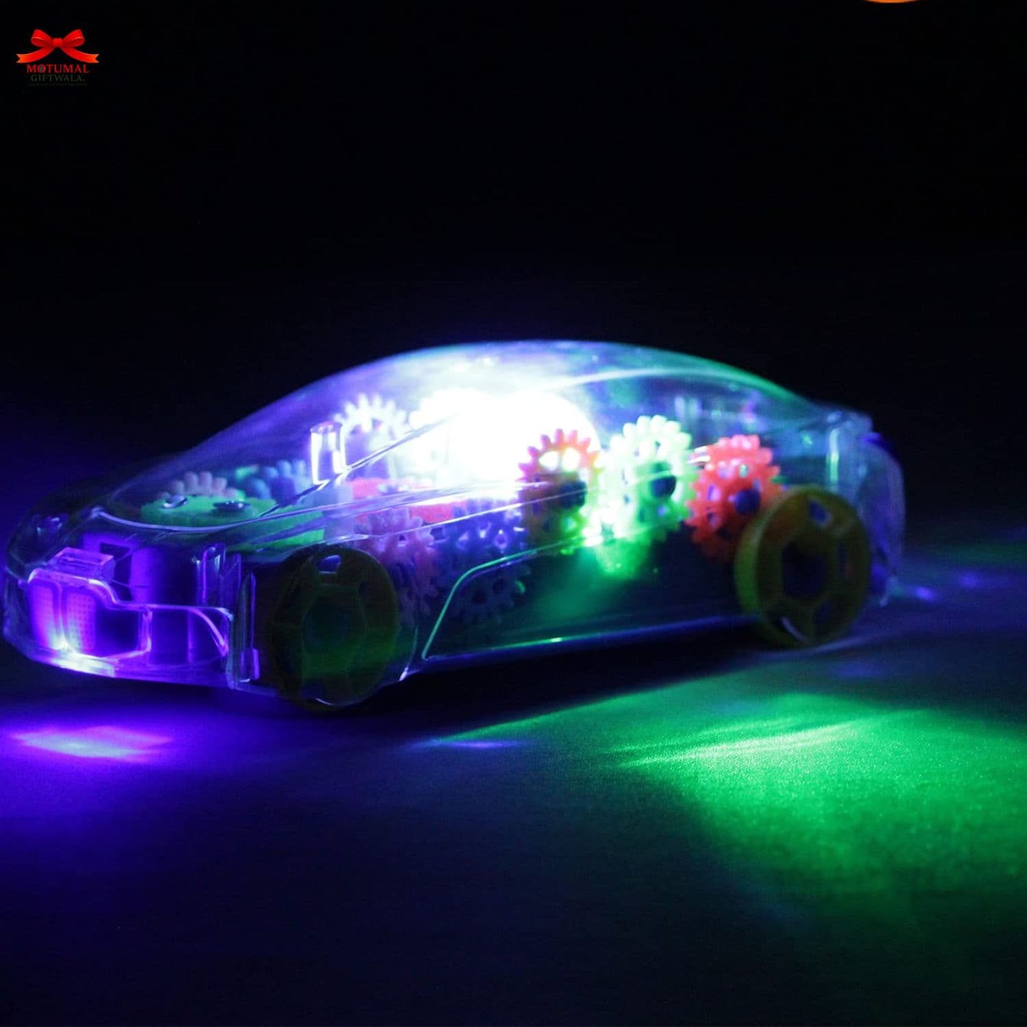 Toy car with colorful gears and LED lights on a dark background
