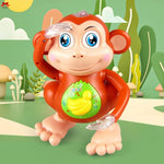 Toy monkey with a banana on a green background