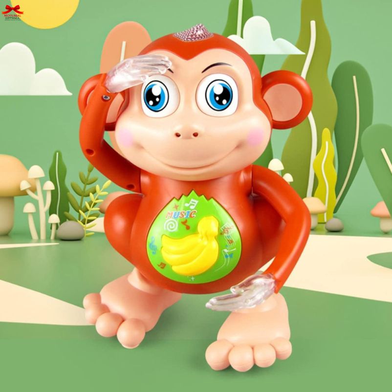 Toy monkey with a banana on a green background