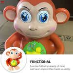 Toy monkey with a green label on a plain background