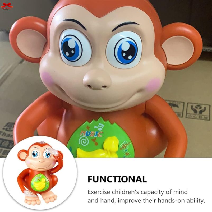 Toy monkey with a green label on a plain background