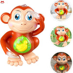Toy monkey with a banana on a white background