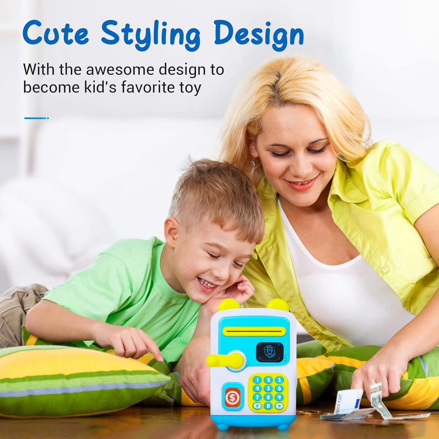 Little child sitting with blue face recognition ATM piggy bank toy labelled best gift for kids, making saving a habit