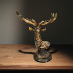  Backside rustic antler sculpture placed indoors
