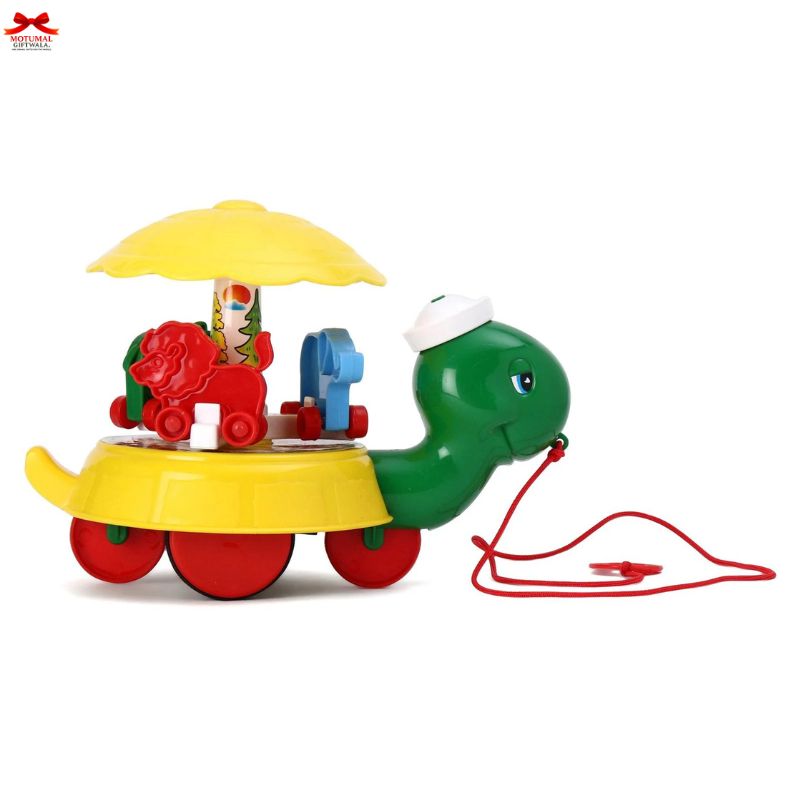 Toy turtle with colorful top and pull string on a white background