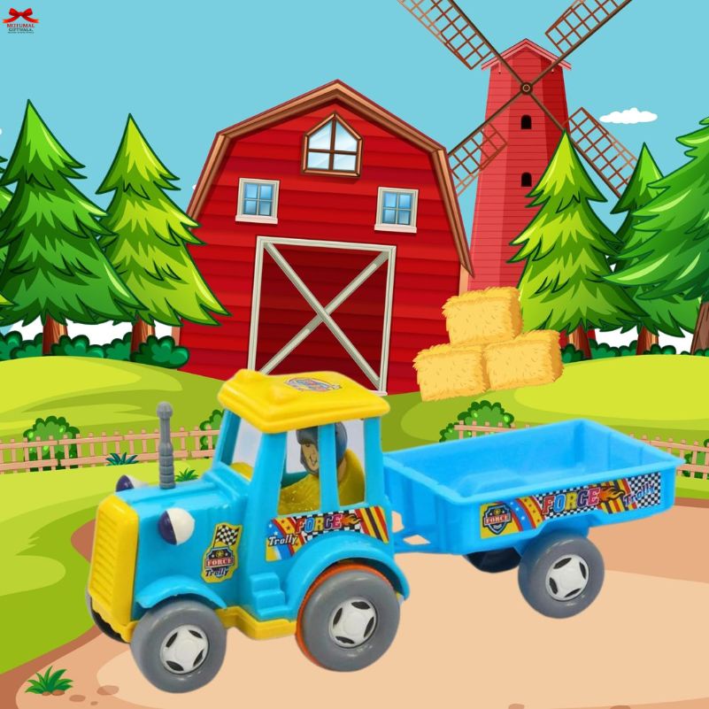 Toy tractor with a blue trailer and yellow roof in front of a red barn and windmill on a farm.