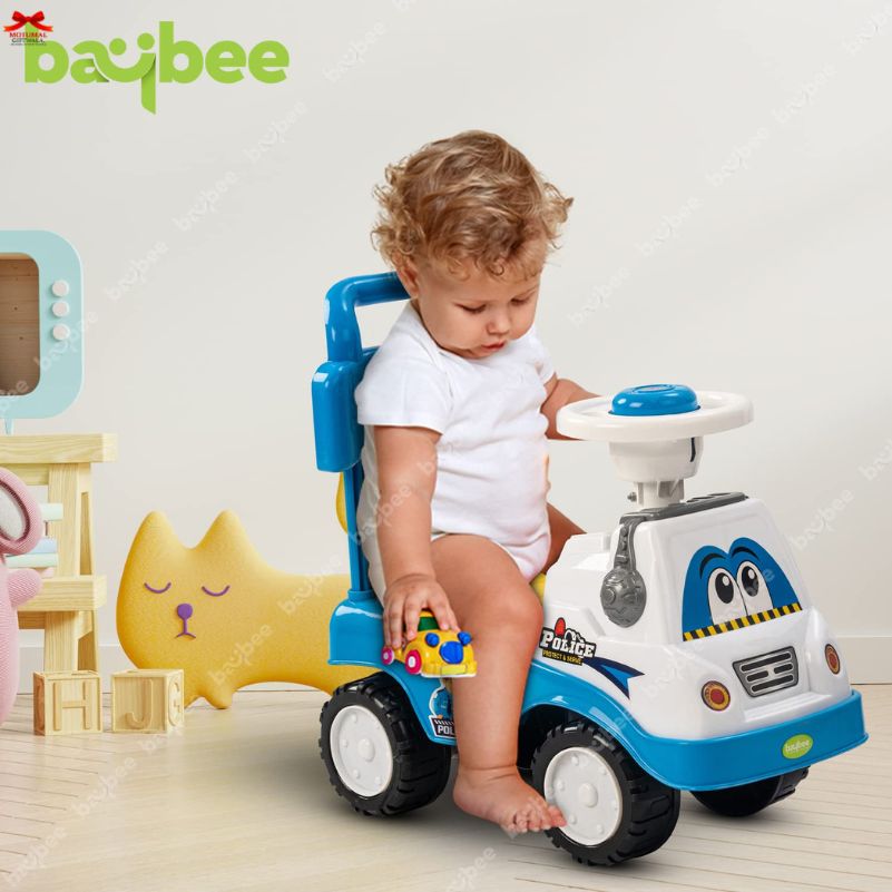Child playing with a toy police car in a room with toys and a Baybee logo.