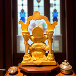 Back view of Ganesh idol showing arch design and fine detailing