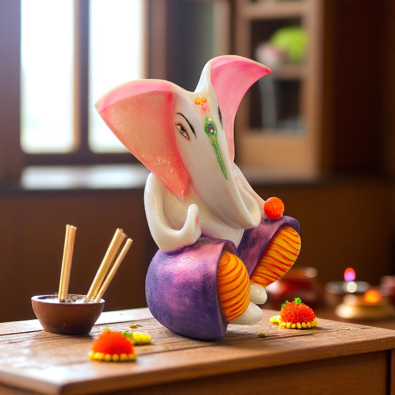  Glossy finish Ganesha with vibrant colors and designer attire