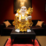  Golden Laughing Buddha in white circular frame front view – Motumal Giftwala Ranchi