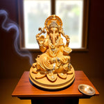 Front view of Ganpati Bappa idol with diya in natural light