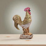 Decorative rooster figurine on a wooden surface with a neutral background