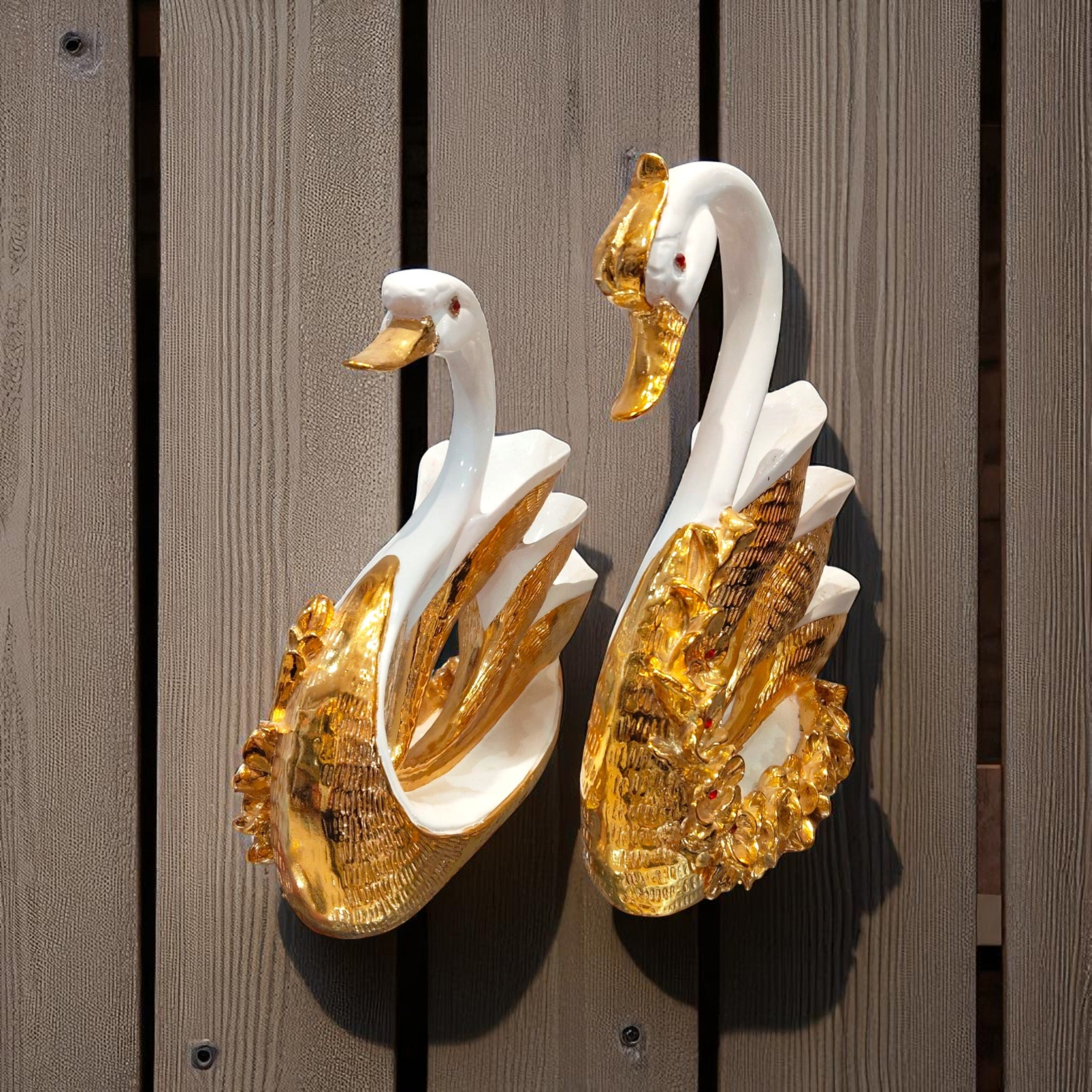  Front view of graceful golden swan couple showpiece