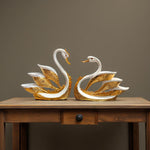 Swan showpieces hanging with artistic golden feather design