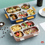 Two compartmentalized lunch boxes with food on a table