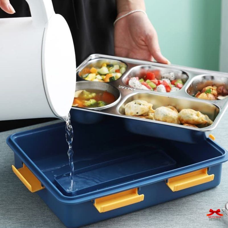Meal prep container with compartments filled with food and water being poured into a blue base.