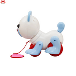 Toy figure of a white and blue character with red shoes on a white background